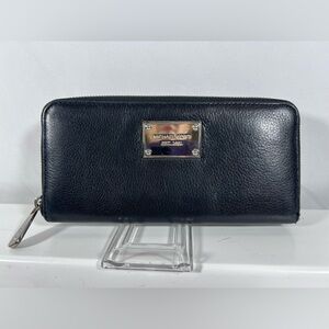 2097: Michael Michael Kors Black Pebbled Leather Zip Around Wallet Organizer